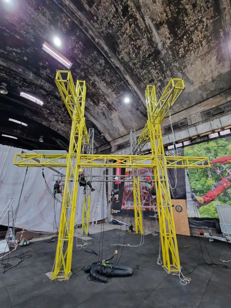 Wide interior view of the yellow Profixt rope access training structure