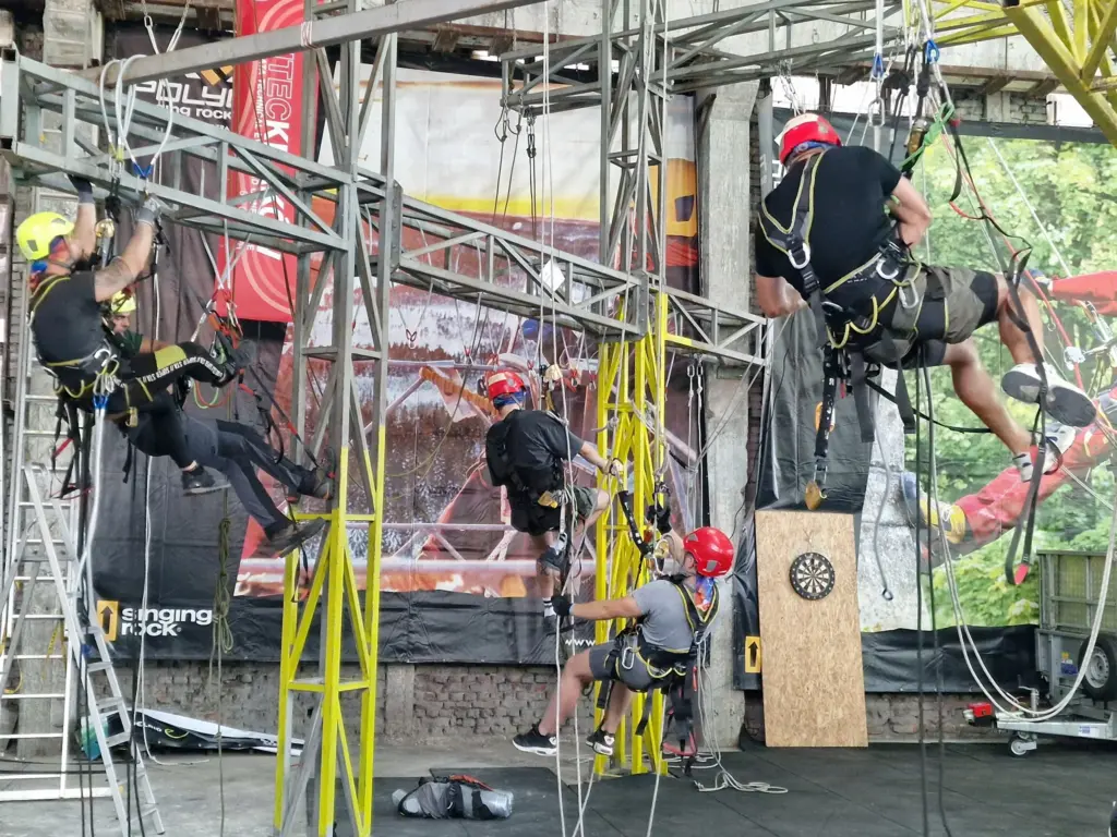 Group rope access practical exercise with instructor supervision