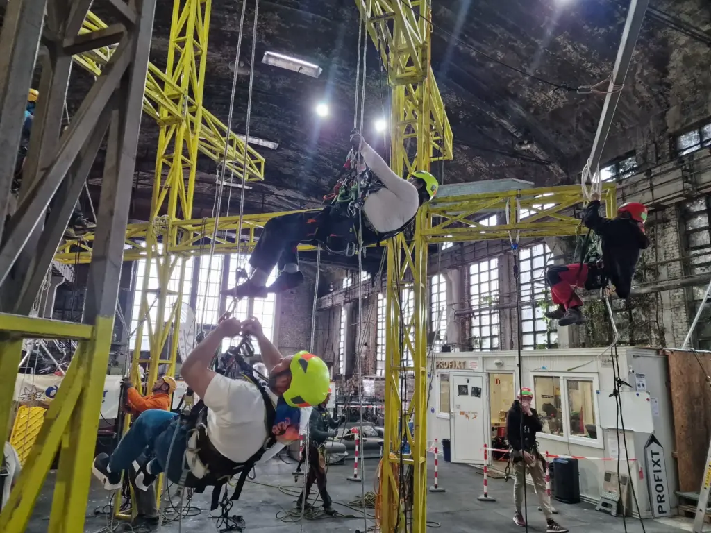 Trainees practising rope access rescue and assisted movement techniques