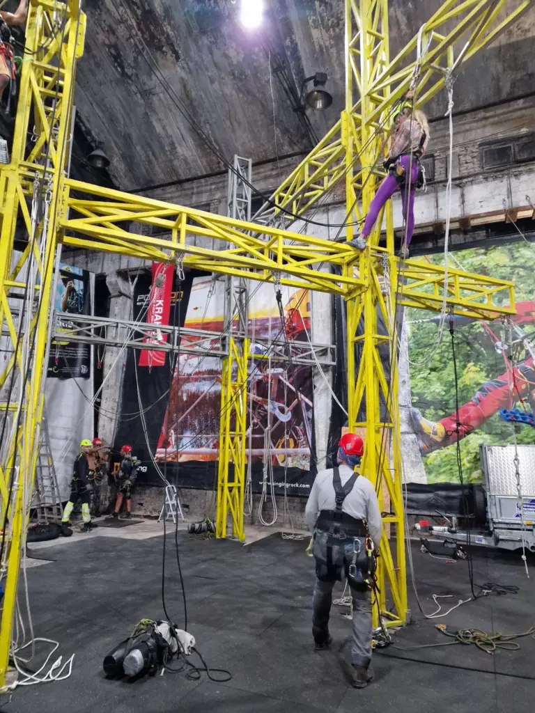 Wide view of a rope access training group practising indoors